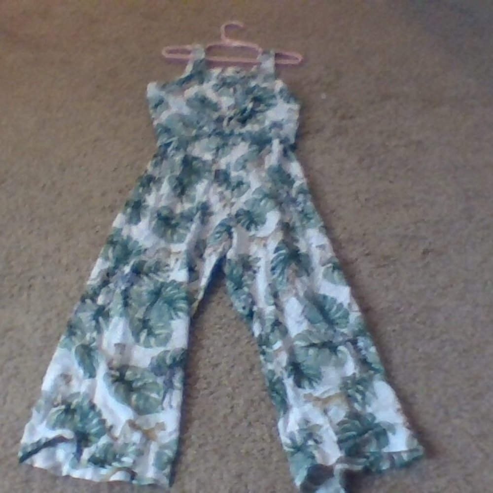 An animal printed pant and shirt together